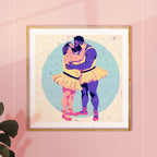 On s'en ballet couilles print in a wood frame on a pink wall: two bearded men in tutus and ballet slippers kissing
